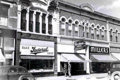 Federal Bakery, Smith Shoe Co., and Miller's Ready To Wear (located at 317, 319, 323 N. Main St.) Austin, Mn