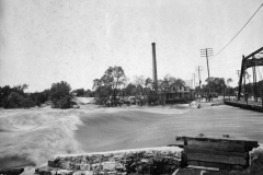 Austin's flood of 1908 was a big one. This picture at the old Water Street bridge (present-day 4th Ave NE) looks west toward the site where Riverside Arena sits today
