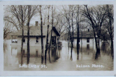 Flooding in Austin along South Railway Street (possibly in the former long-time area of Buffy the Cow) from 1930s or 1940s