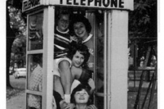 Austin High School students in a telephone booth - 1963