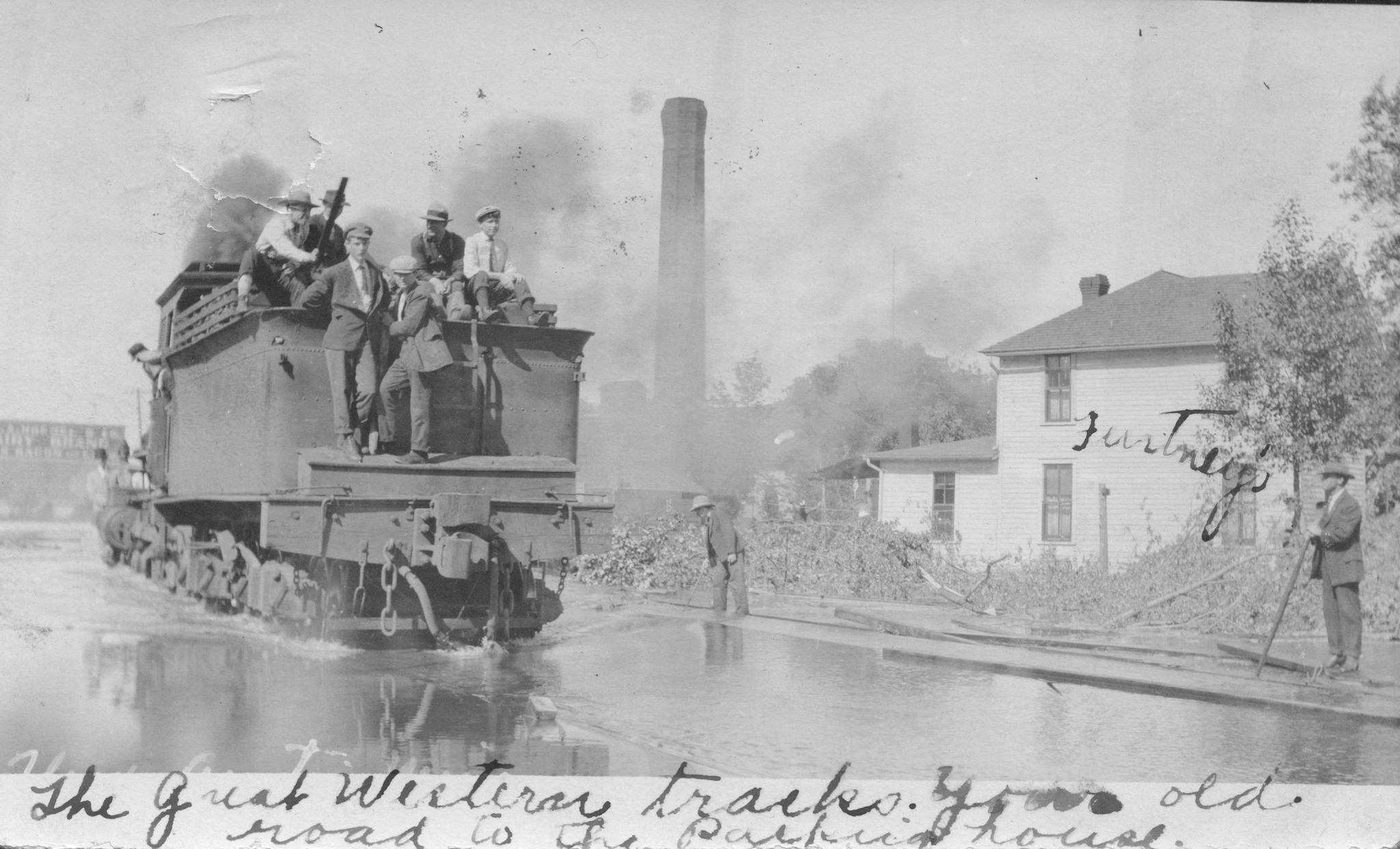 train-going-through-floodwater-in-June-1908